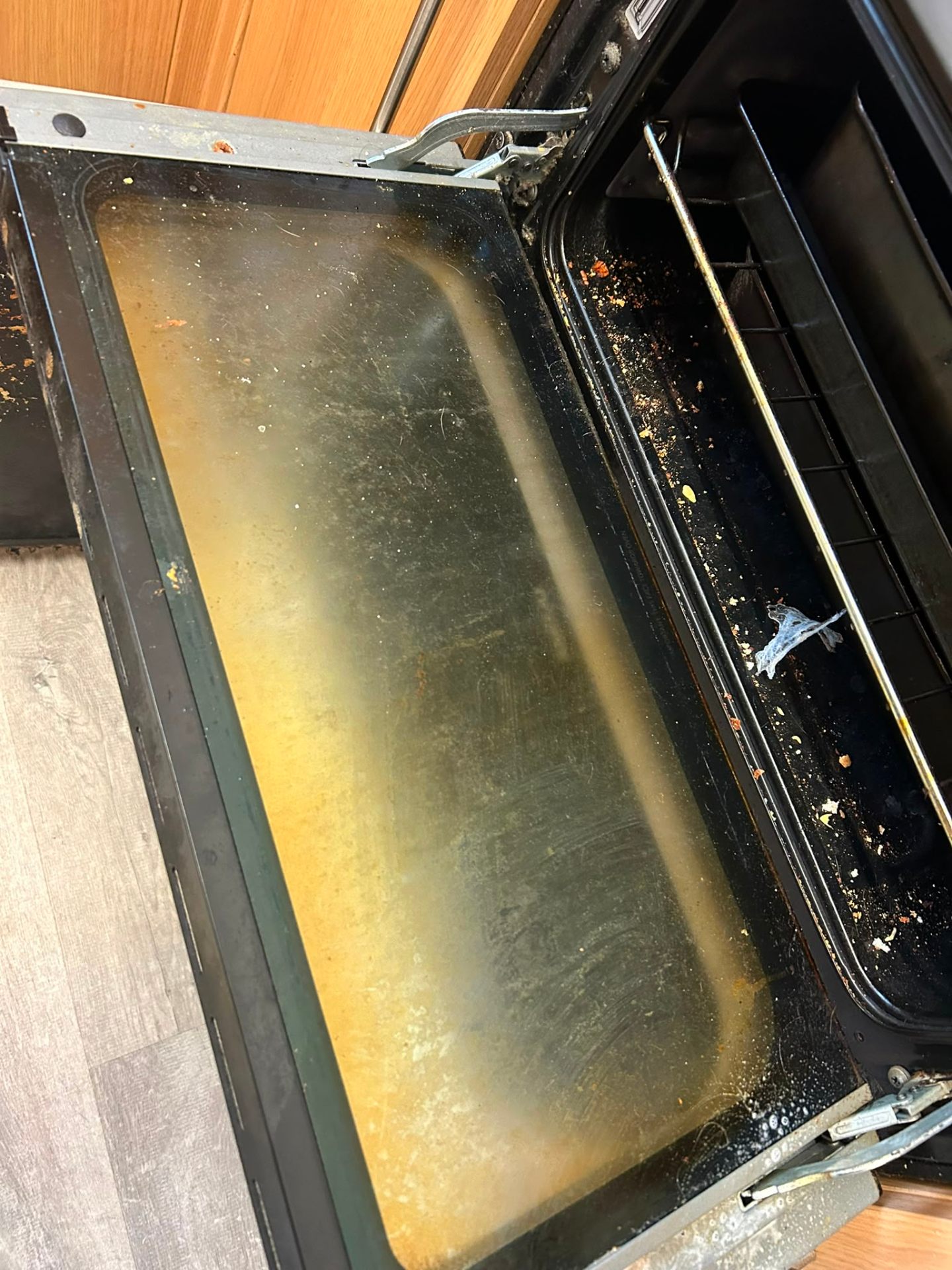 Before — Burnt-on oven grime cleared