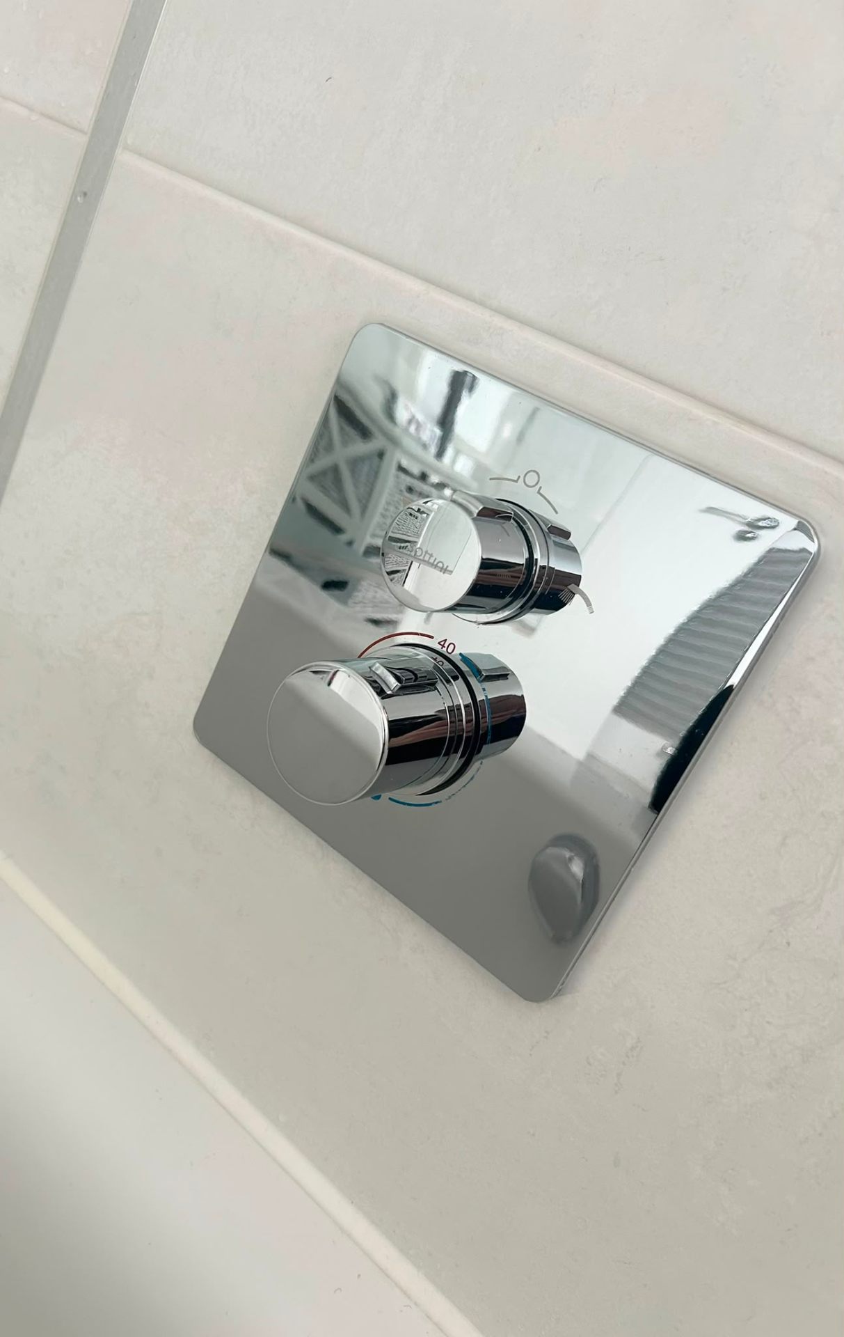 After — Shower thermostat polished