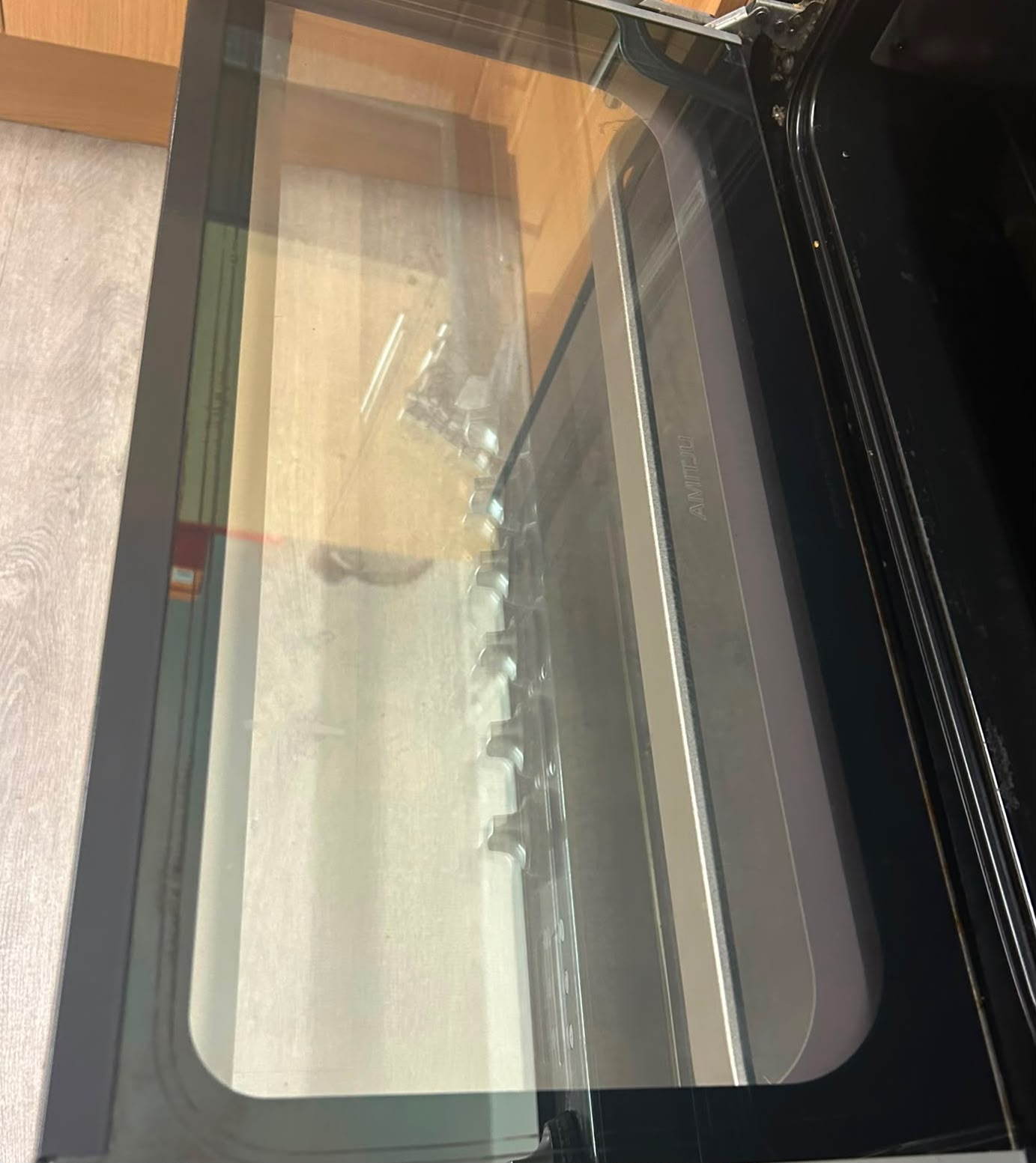 After — Burnt-on oven grime cleared